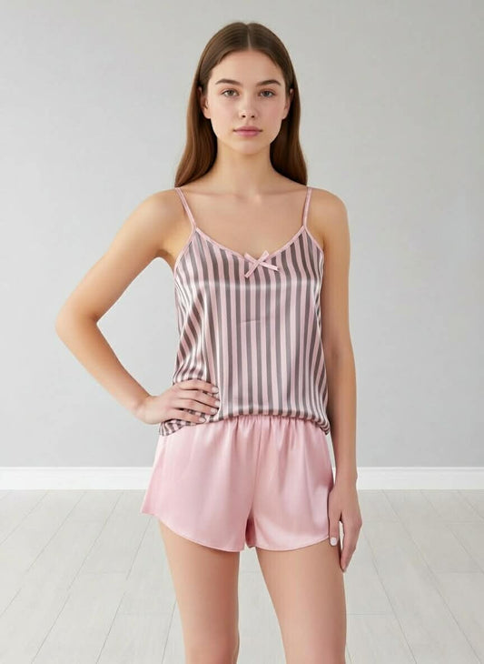 This elegant two-piece pajama set features a luxurious Syrian satin